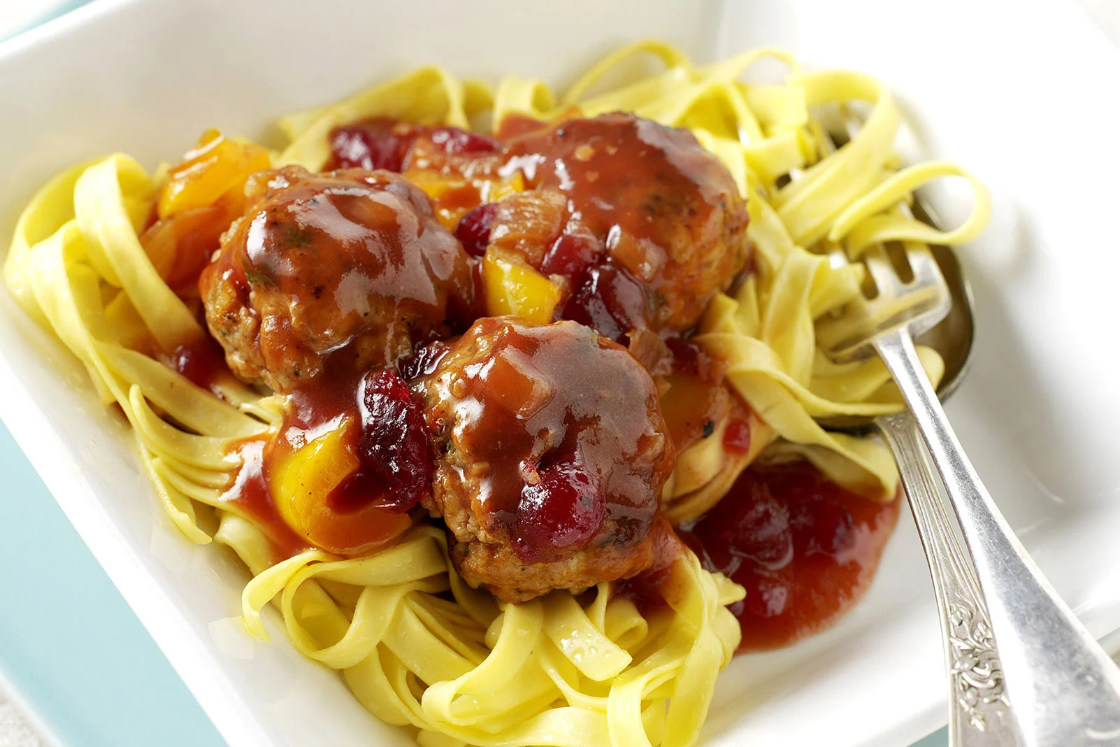 Herby Pork Meatballs with Cranberry Gravy